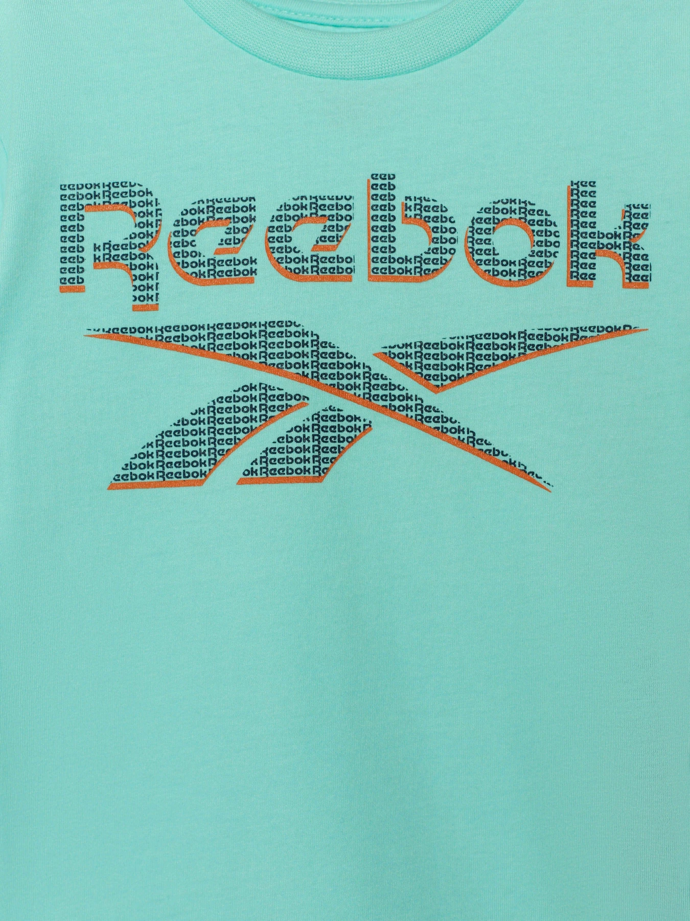 Костюми Reebok 2 PIECES SPORTSWEAR FIT GRAPHI модель C9036RB4_BLUE Костюми Reebok 2 PIECES SPORTSWEAR FIT GRAPHI модель C9036RB4_BLUE Фото