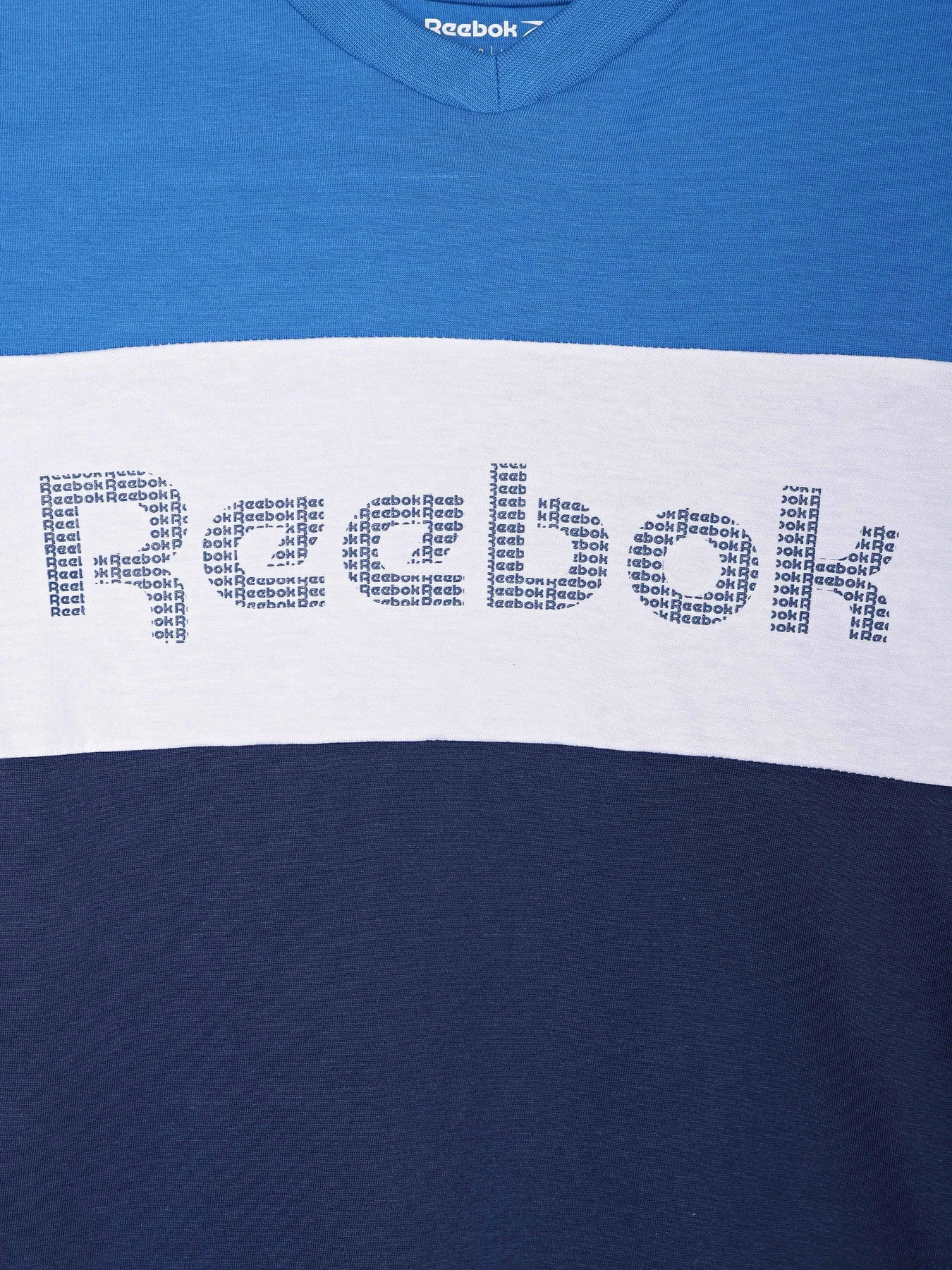 Футболки и поло Reebok модель H9738RB_BLUE Футболки и поло Reebok модель H9738RB_BLUE Фото