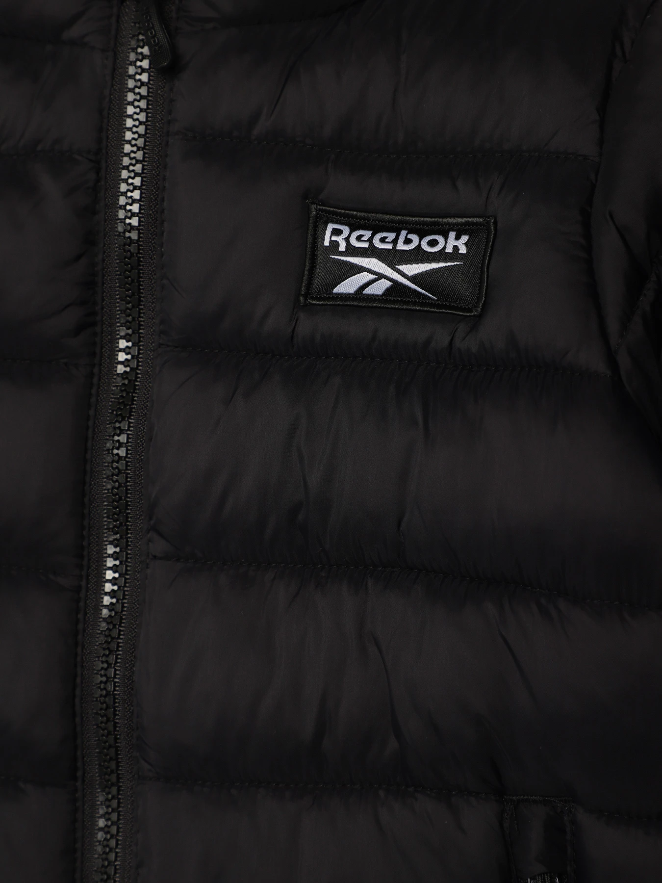 Куртки та дублянки Reebok модель OTRB1063TK_BLACK Куртки та дублянки Reebok модель OTRB1063TK_BLACK Фото