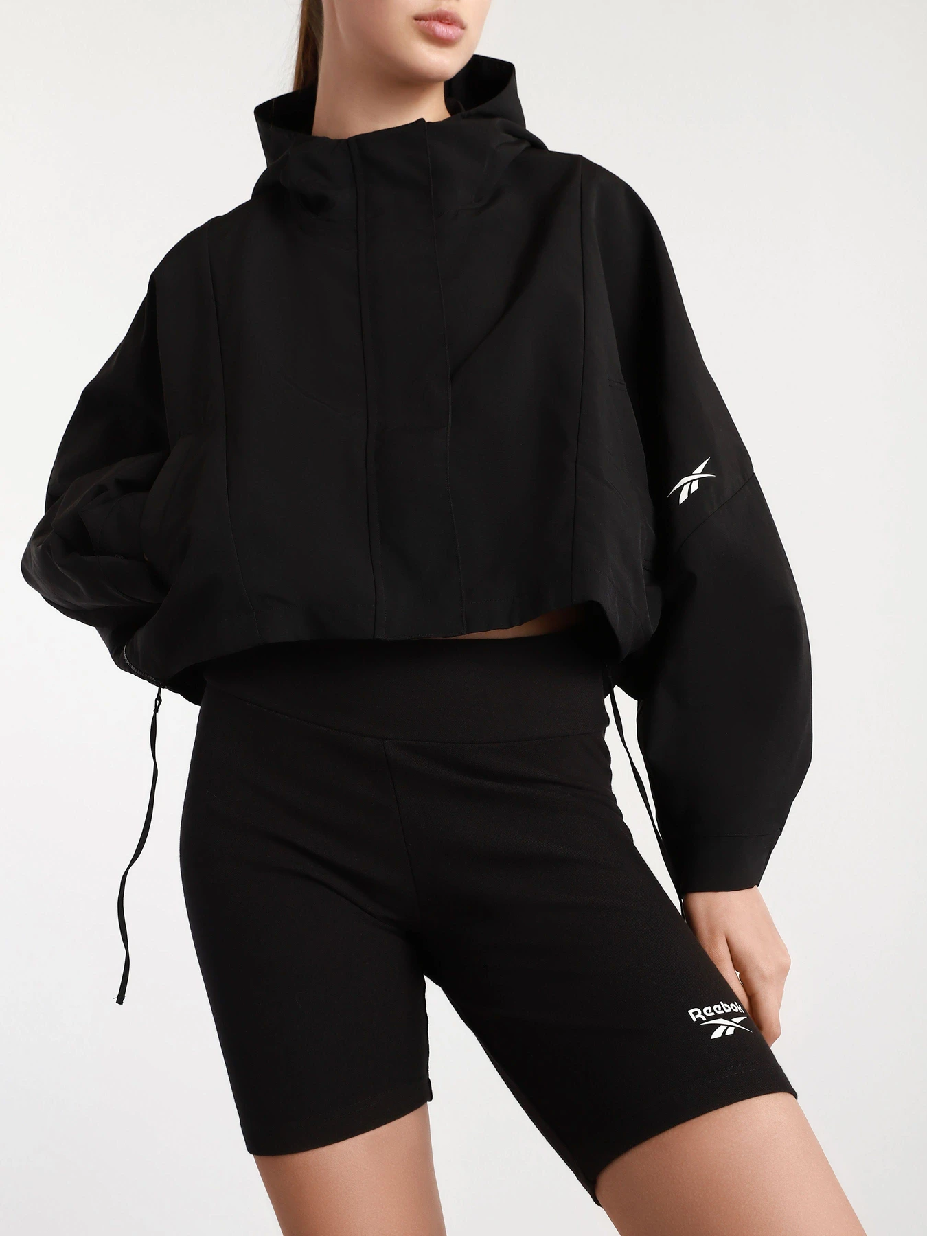 Худі та світшоти Reebok LAYERING WOVEN модель GL2594 Худі та світшоти Reebok LAYERING WOVEN модель GL2594 Фото