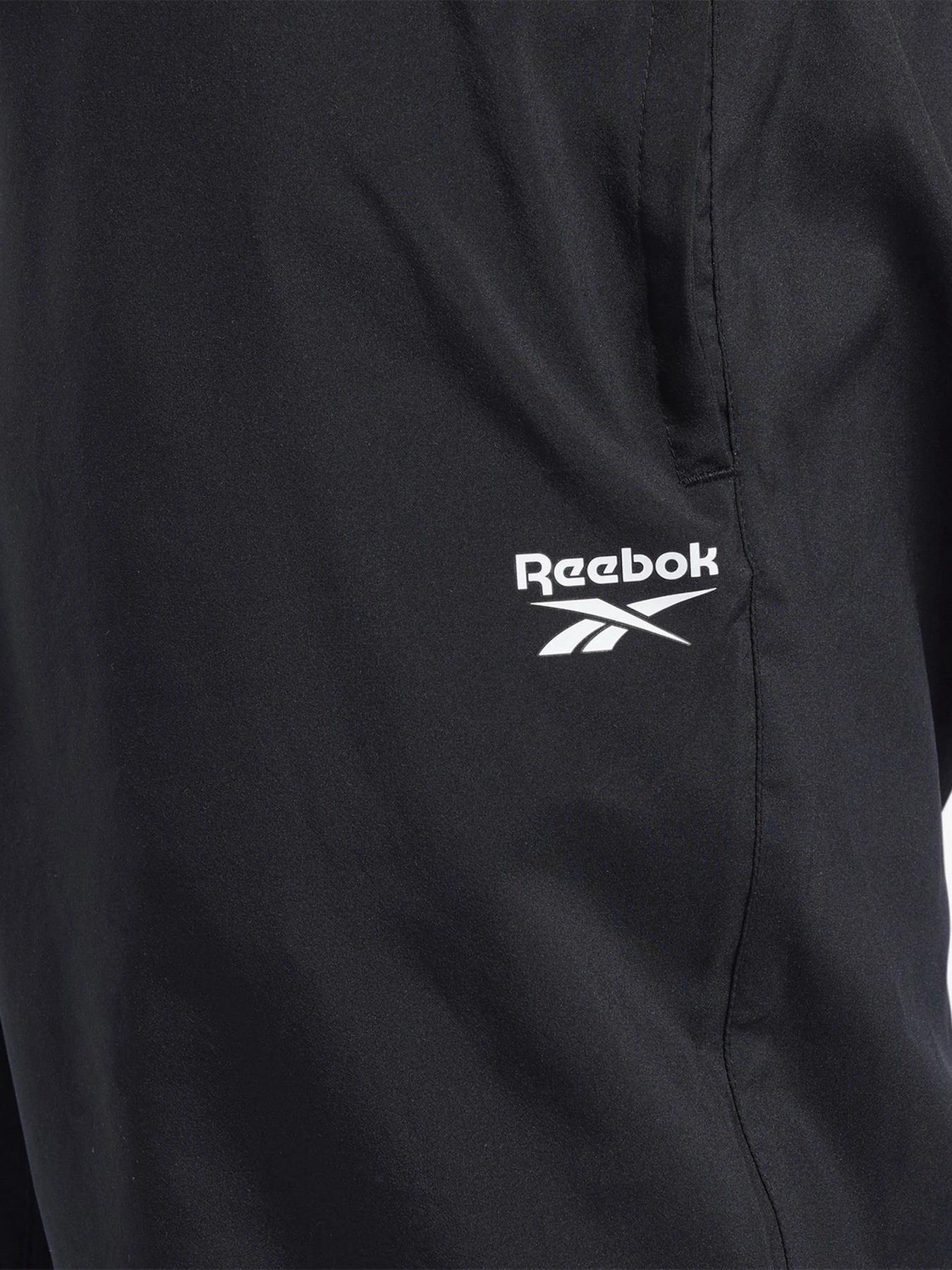 Брюки Reebok Training Essentials Woven Cuffed модель FP9141 Фото
