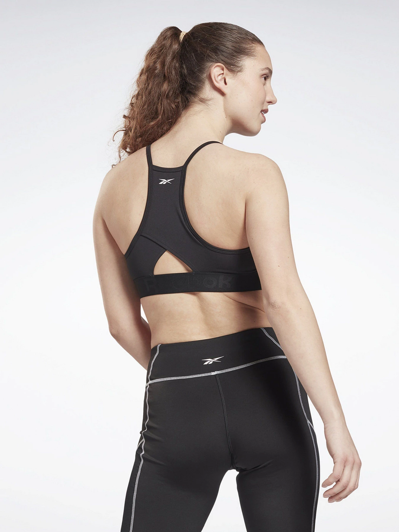 Футболки і поло Reebok Strappy Back Low-Impact модель GR9459 Футболки і поло Reebok Strappy Back Low-Impact модель GR9459 Фото