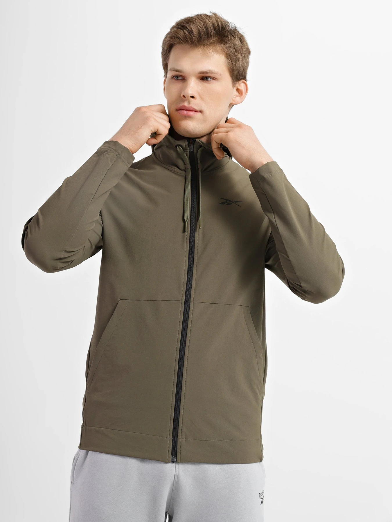 Худі та світшоти Reebok Performance Woven Zip Up модель H44117 Худі та світшоти Reebok Performance Woven Zip Up модель H44117 Фото