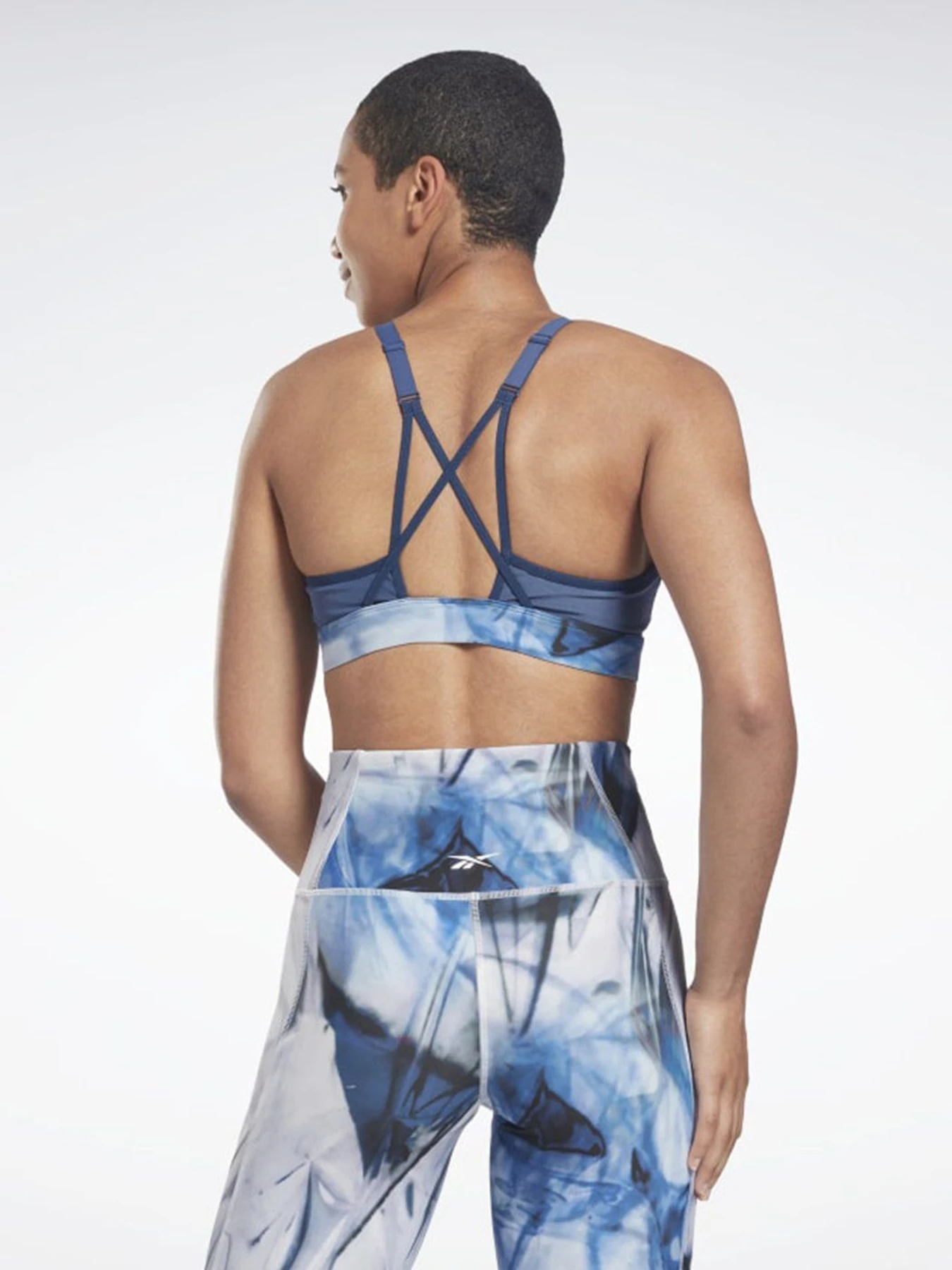 Футболки и поло Reebok Lux Strappy Liquid Abyss Print модель H51860 Футболки и поло Reebok Lux Strappy Liquid Abyss Print модель H51860 Фото
