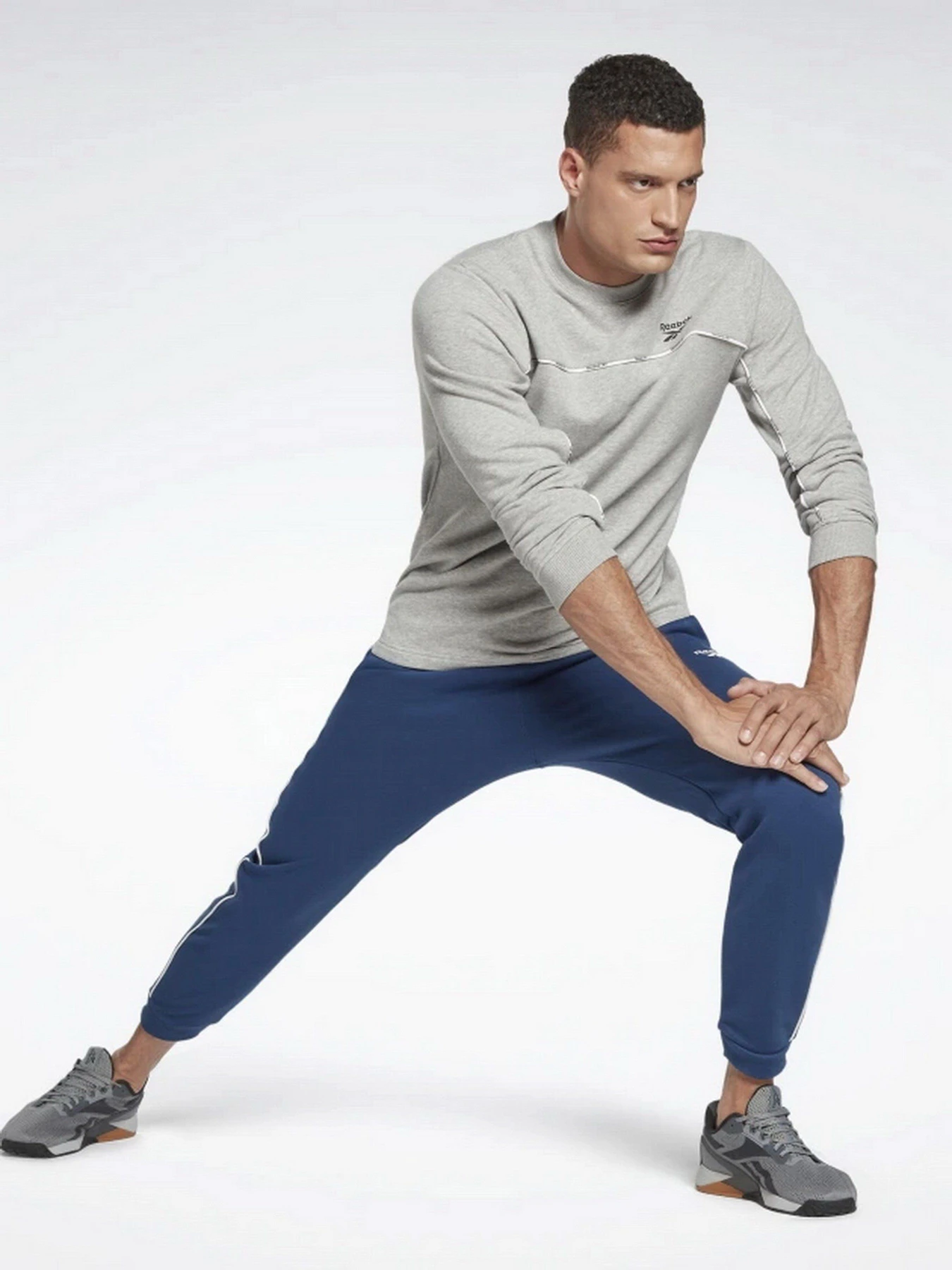 Худі та світшоти Reebok Piping Crew модель HA1069 Фото