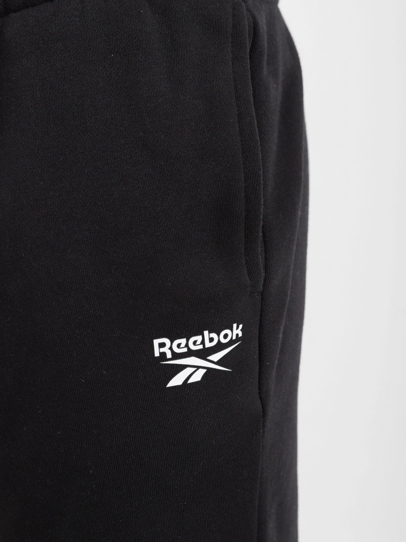 Брюки Reebok RI LEFT LEG JOGGER модель HG4456 Фото