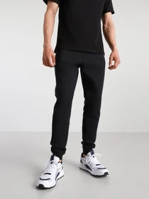 Брюки CONVERSE COURT LIFESTYLE SLIM модель 10021493-001 Фото