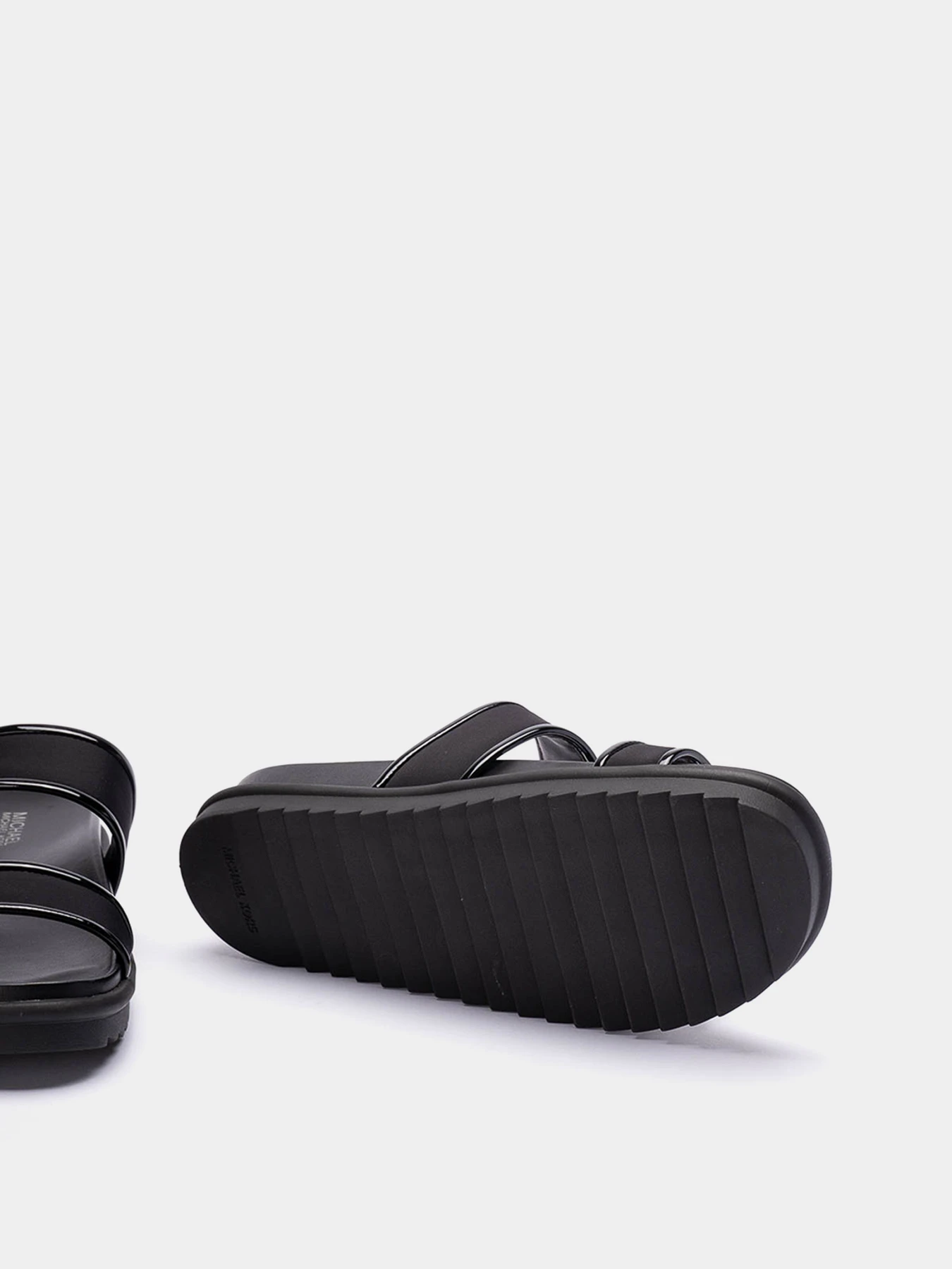Шльопанці Michael Kors модель 40S4COFS1D_001 Шльопанці Michael Kors модель 40S4COFS1D_001 Фото