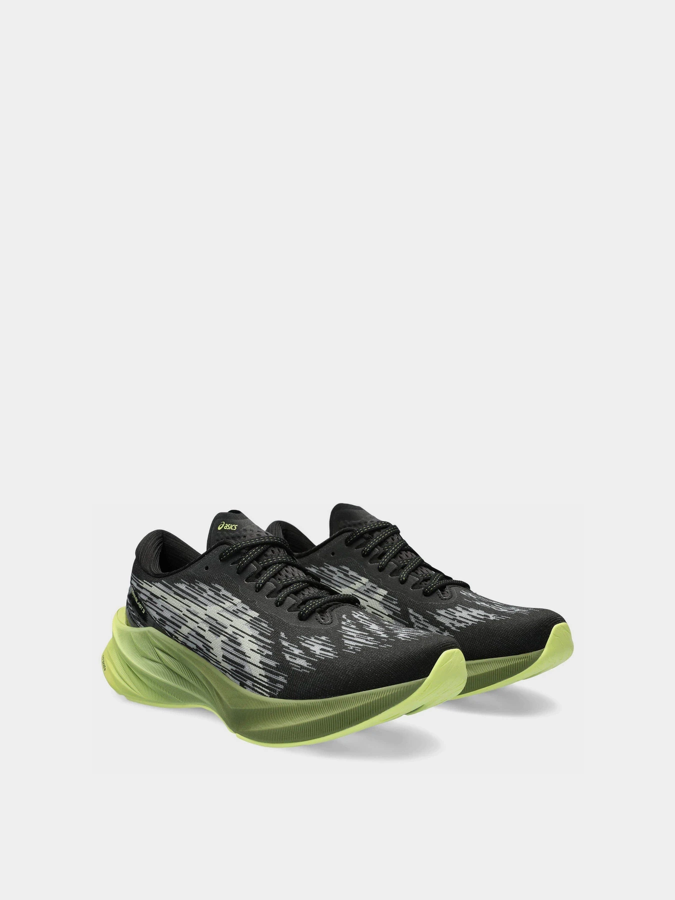 Кросівки Asics Novablast 3 модель 1011B458-005 Чорний, зелений Кросівки Asics Novablast 3 модель 1011B458-005 Чорний, зелений Фото