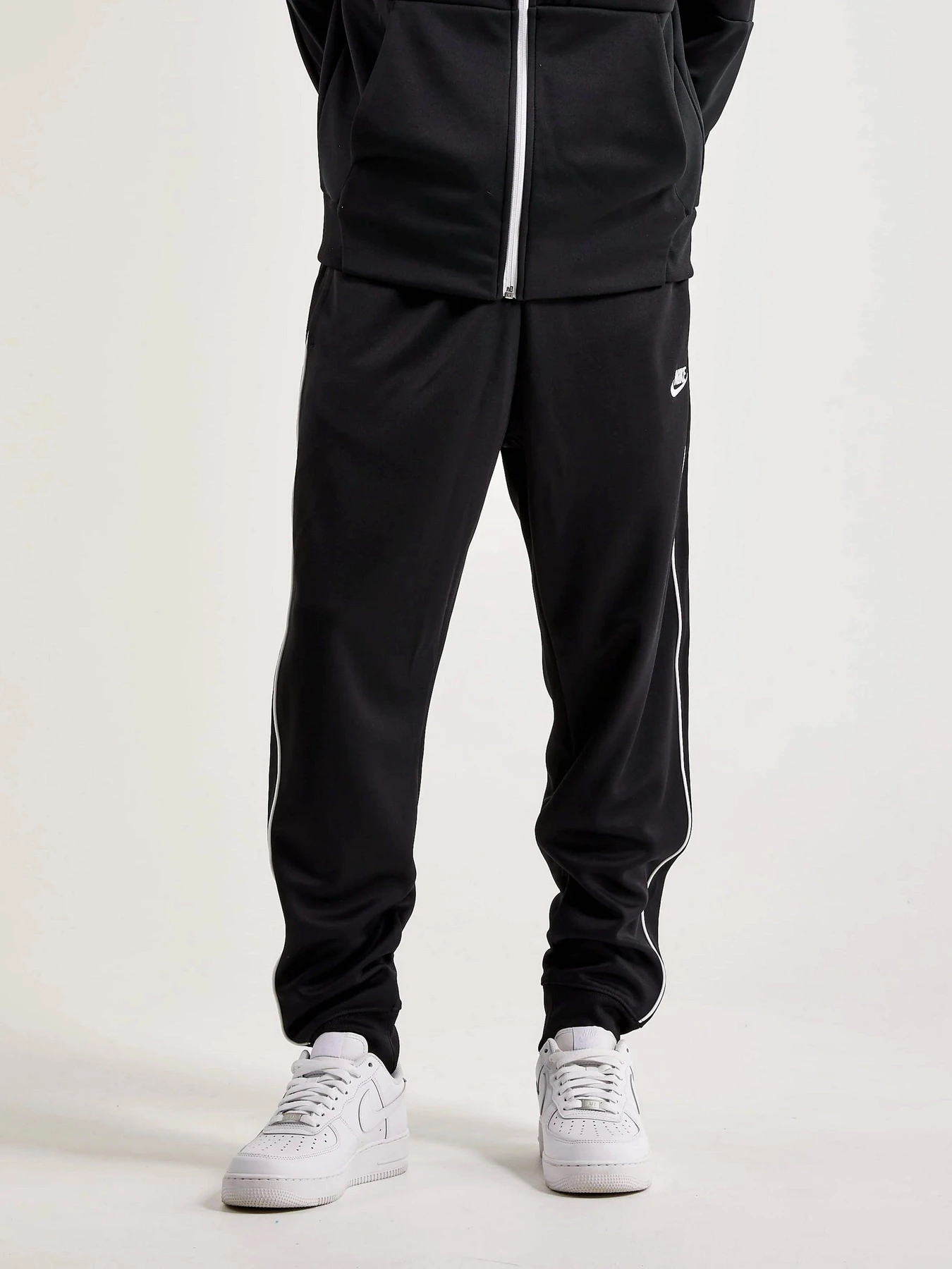 Брюки NIKE M NK CLUB PK PANT модель DX0615-010 Фото