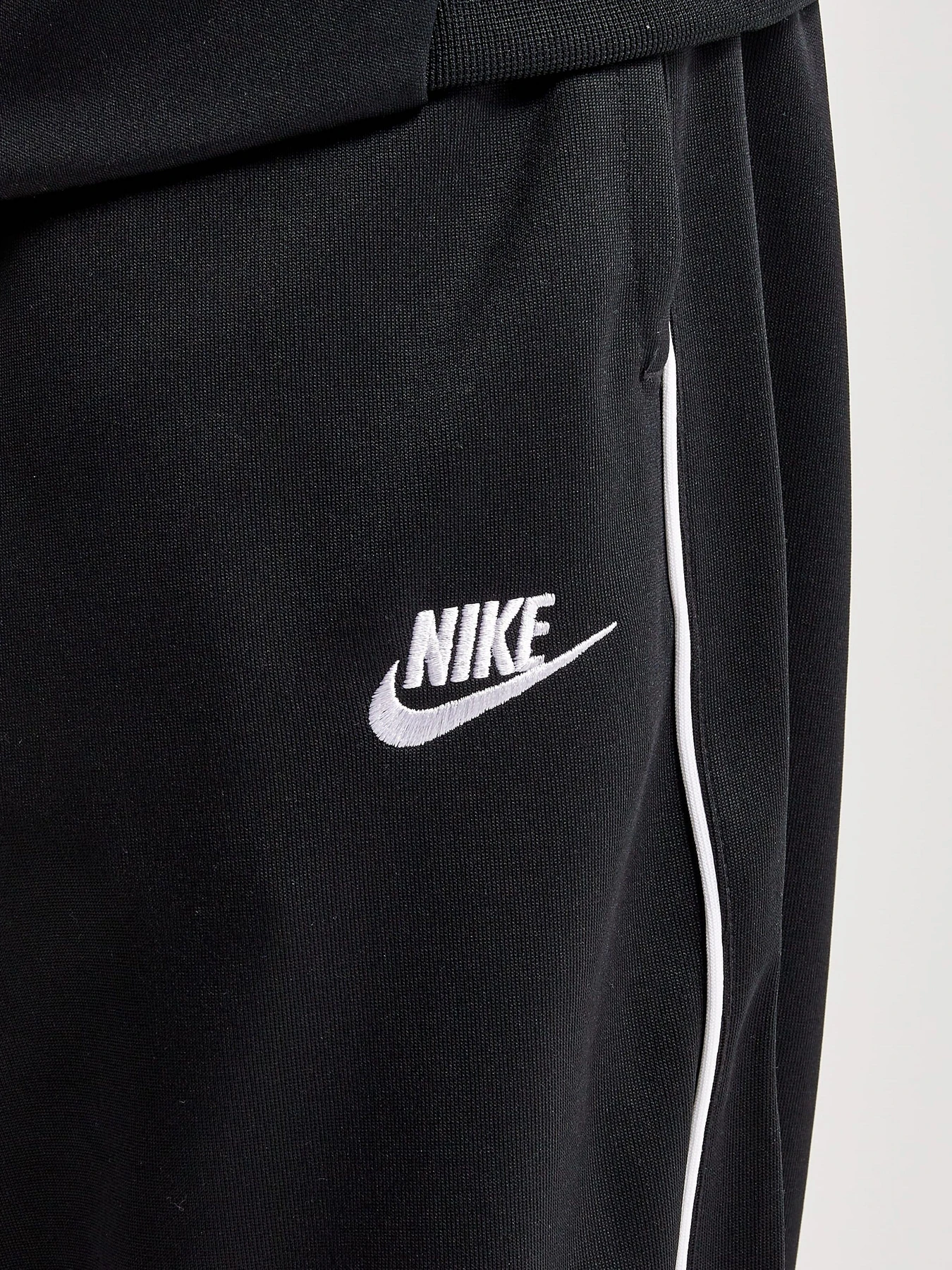 Брюки NIKE M NK CLUB PK PANT модель DX0615-010 Фото