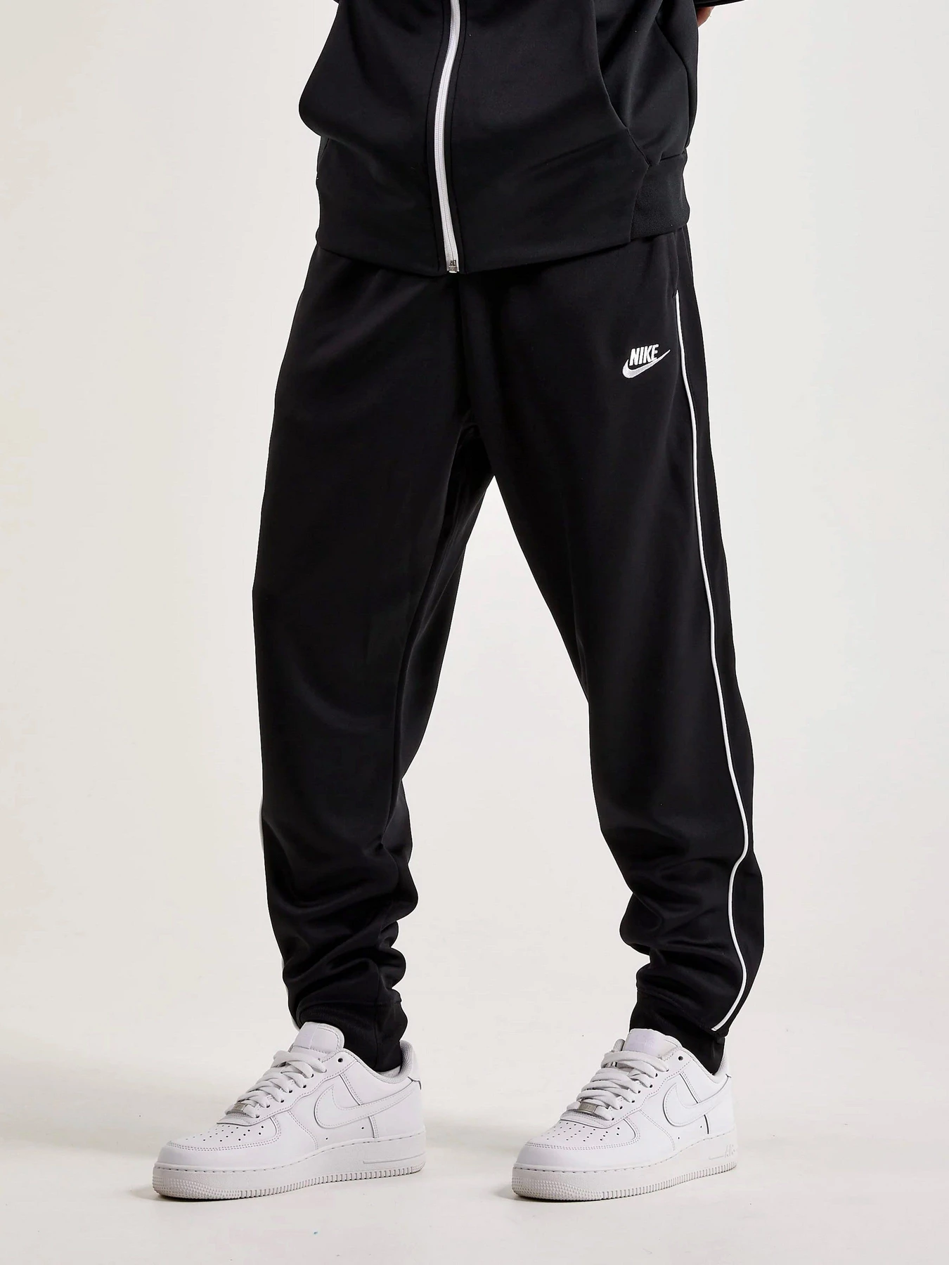 Брюки NIKE M NK CLUB PK PANT модель DX0615-010 Фото