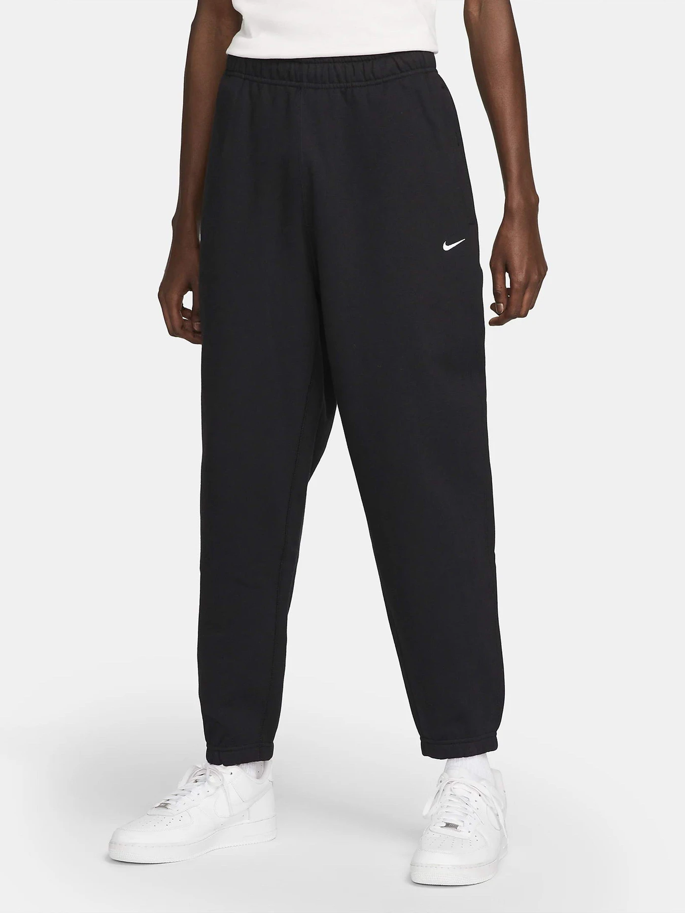 Брюки NIKE Solo Swoosh Fleece модель DX1364-010 Брюки NIKE Solo Swoosh Fleece модель DX1364-010 Фото