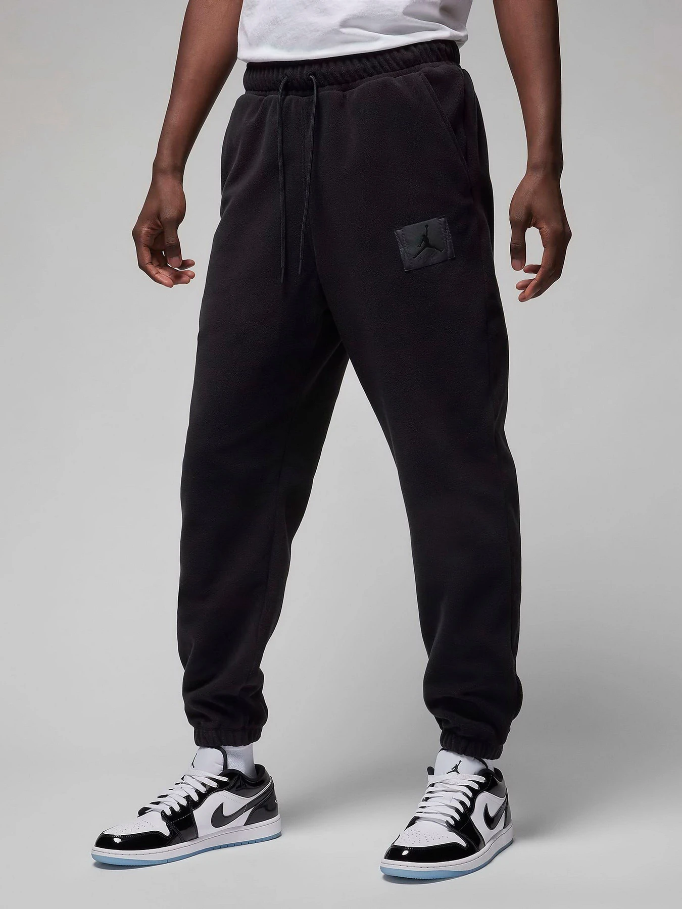 Штани NIKE Air Jordan Essentials Fleece Winter модель FD7531-010 Штани NIKE Air Jordan Essentials Fleece Winter модель FD7531-010 Фото