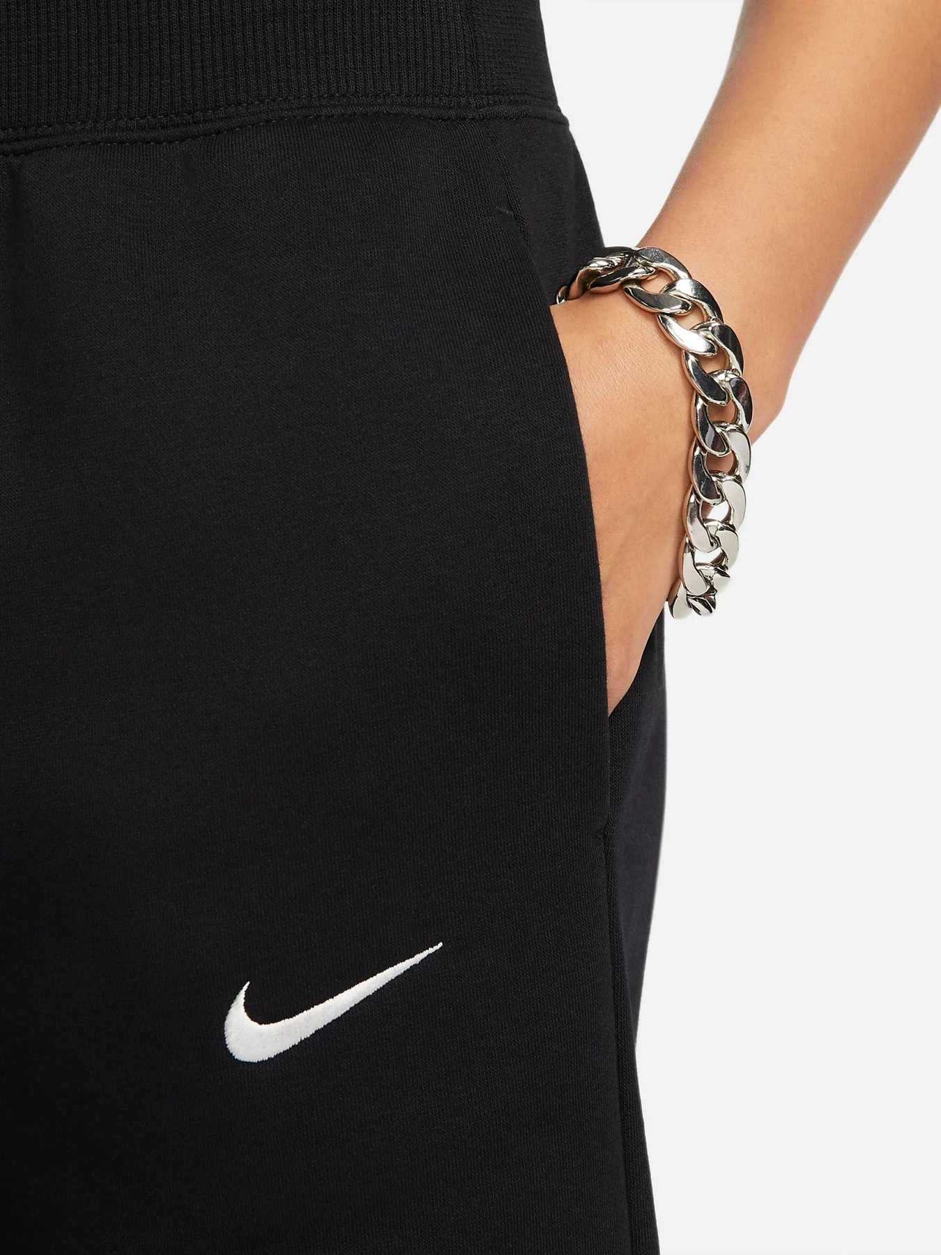 Брюки NIKE PHNX FLC HR CROP SWTP модель FB8313-010 Брюки NIKE PHNX FLC HR CROP SWTP модель FB8313-010 Фото
