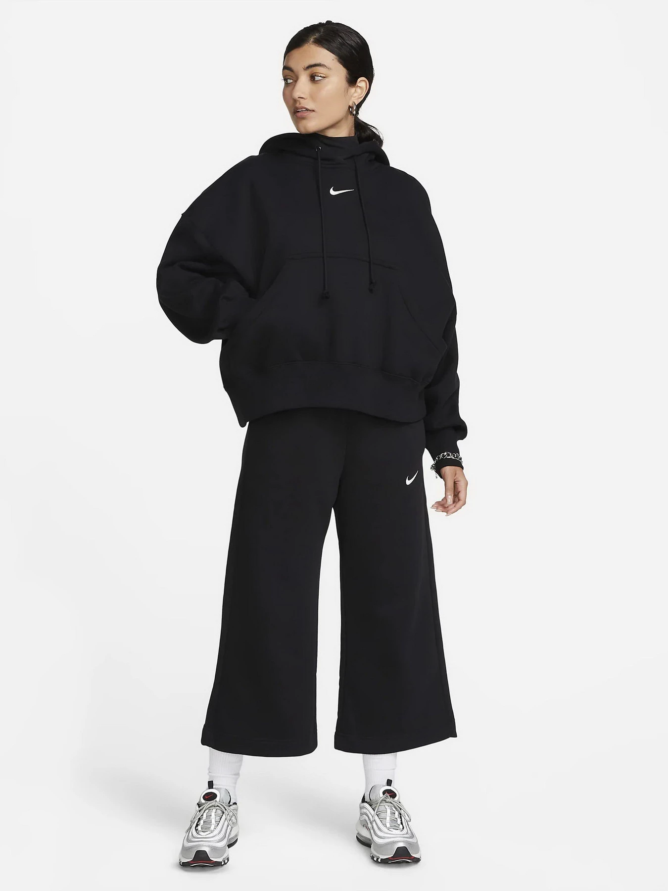 Брюки NIKE PHNX FLC HR CROP SWTP модель FB8313-010 Брюки NIKE PHNX FLC HR CROP SWTP модель FB8313-010 Фото