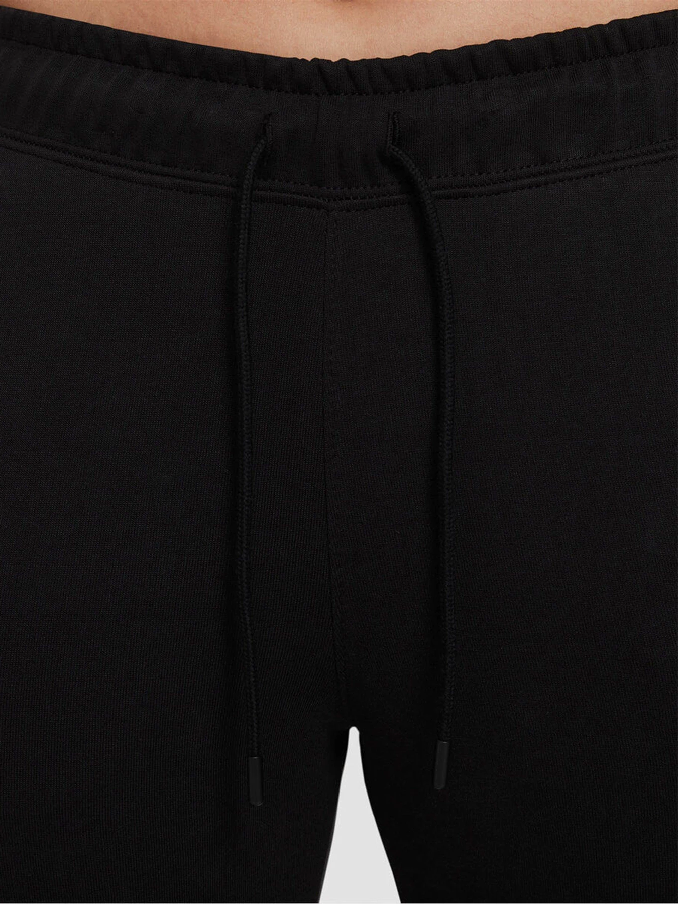Штани NIKE Sportswear Millenium Fleece модель CZ8340-010 Штани NIKE Sportswear Millenium Fleece модель CZ8340-010 Фото