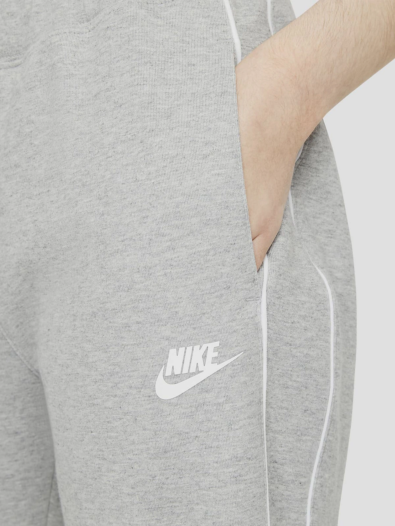 Брюки NIKE NSW JOGGER MLNM FLC модель CZ8340-063 Брюки NIKE NSW JOGGER MLNM FLC модель CZ8340-063 Фото