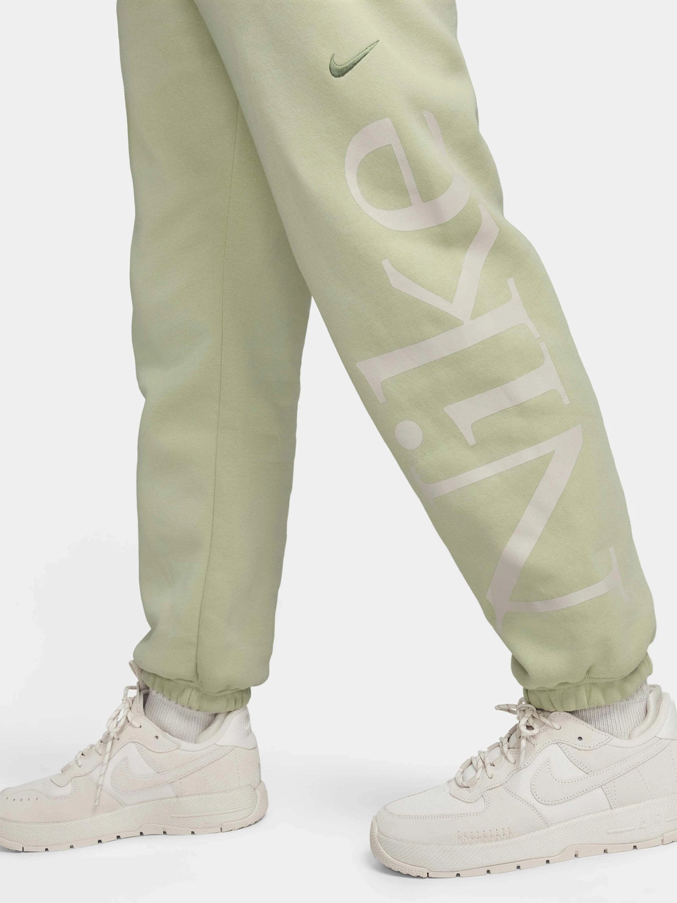 Брюки NIKE PHNX FLC OS LOGO модель FN2552-371 Брюки NIKE PHNX FLC OS LOGO модель FN2552-371 Фото