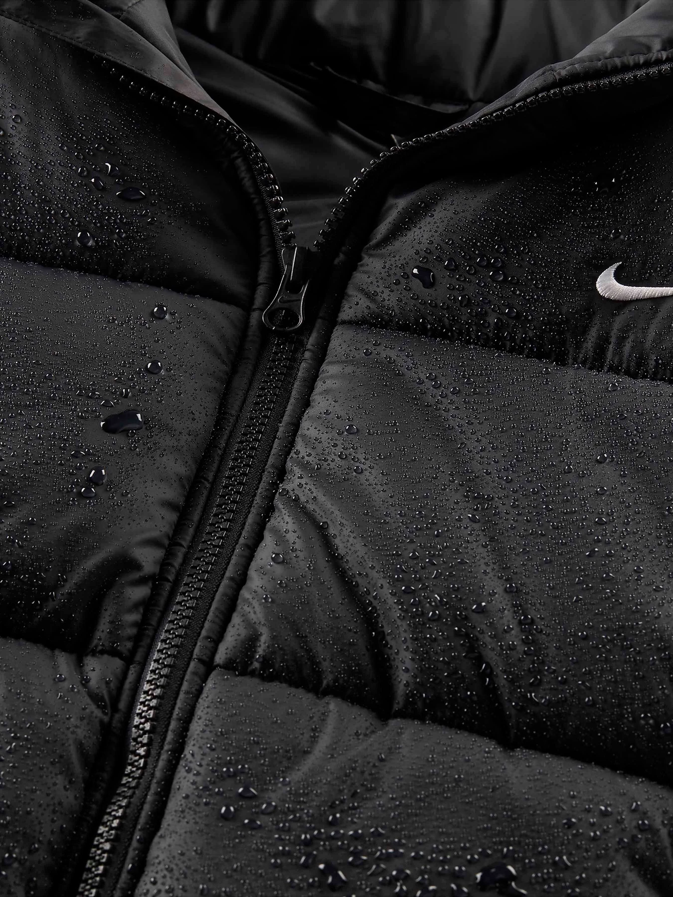 Куртки та дублянки NIKE SPORTSWEAR CLASSIC PUFFER THER модель FZ5922-010 Фото