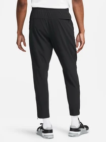 Брюки NIKE DRI-FIT UNLIMITED PANT TAPERED модель FB7548-010 Фото