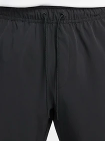 Брюки NIKE DRI-FIT UNLIMITED PANT TAPERED модель FB7548-010 Фото