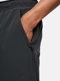 Брюки NIKE DRI-FIT UNLIMITED PANT TAPERED модель FB7548-010 Фото