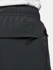 Брюки NIKE DRI-FIT UNLIMITED PANT TAPERED модель FB7548-010 Фото