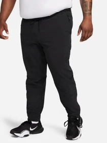 Брюки NIKE DRI-FIT UNLIMITED PANT TAPERED модель FB7548-010 Фото