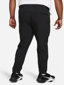 Брюки NIKE DRI-FIT UNLIMITED PANT TAPERED модель FB7548-010 Фото