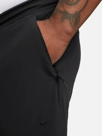 Брюки NIKE DRI-FIT UNLIMITED PANT TAPERED модель FB7548-010 Фото