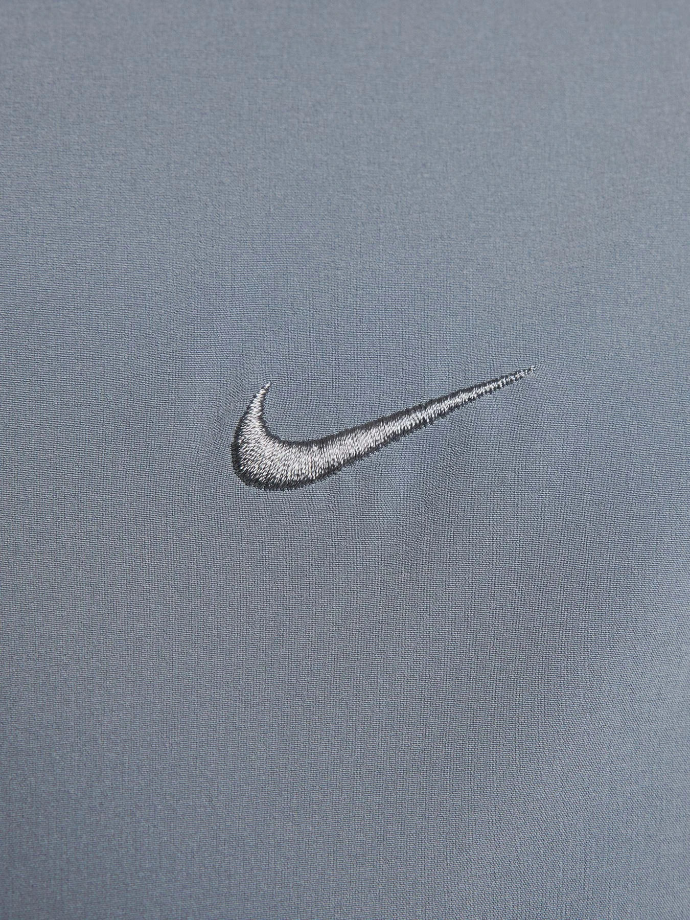 Куртки и дубленки NIKE UNLIMITED WATER-REPELLENT HOOD модель FB7551-084 Фото