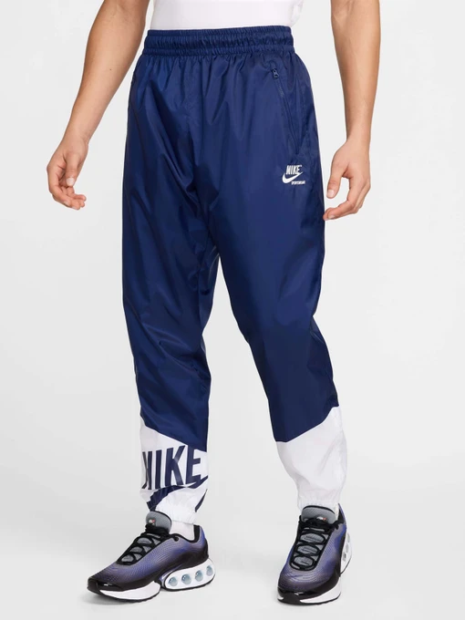 Брюки NIKE WINDRUNNER модель HJ2034-492 Фото