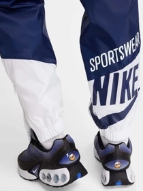 Штани NIKE WINDRUNNER модель HJ2034-492 Фото