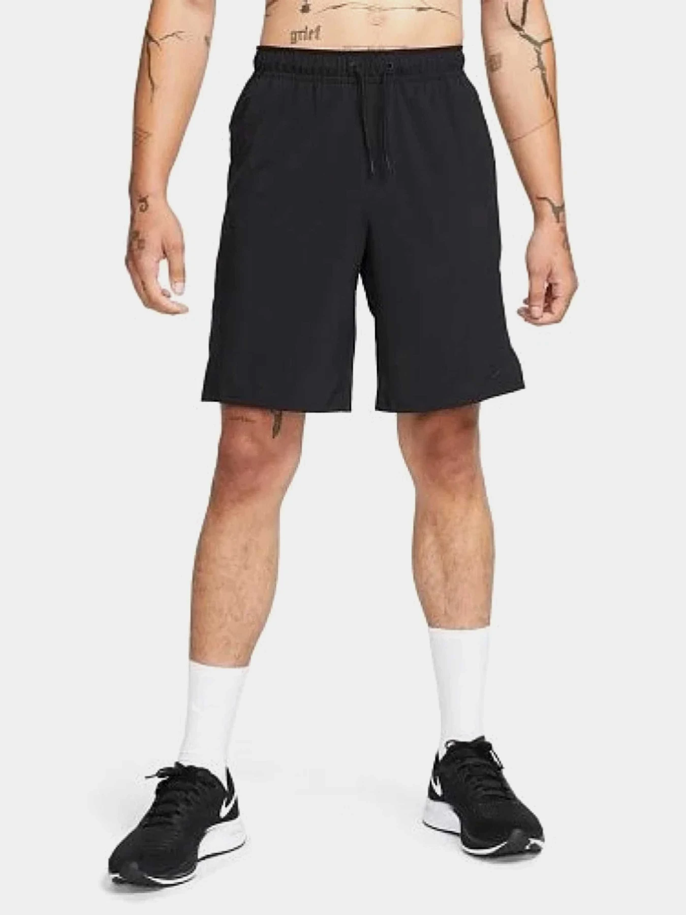 Шорты NIKE DRI-FIT UNLIMITED WOVEN 9IN UN модель DV9330-010 Шорты NIKE DRI-FIT UNLIMITED WOVEN 9IN UN модель DV9330-010 Фото