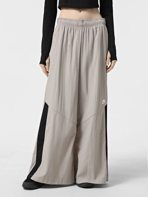 Брюки NIKE SPORTSWEAR WOMEN'S WIDE-LEG WO модель IH8508-009 Фото