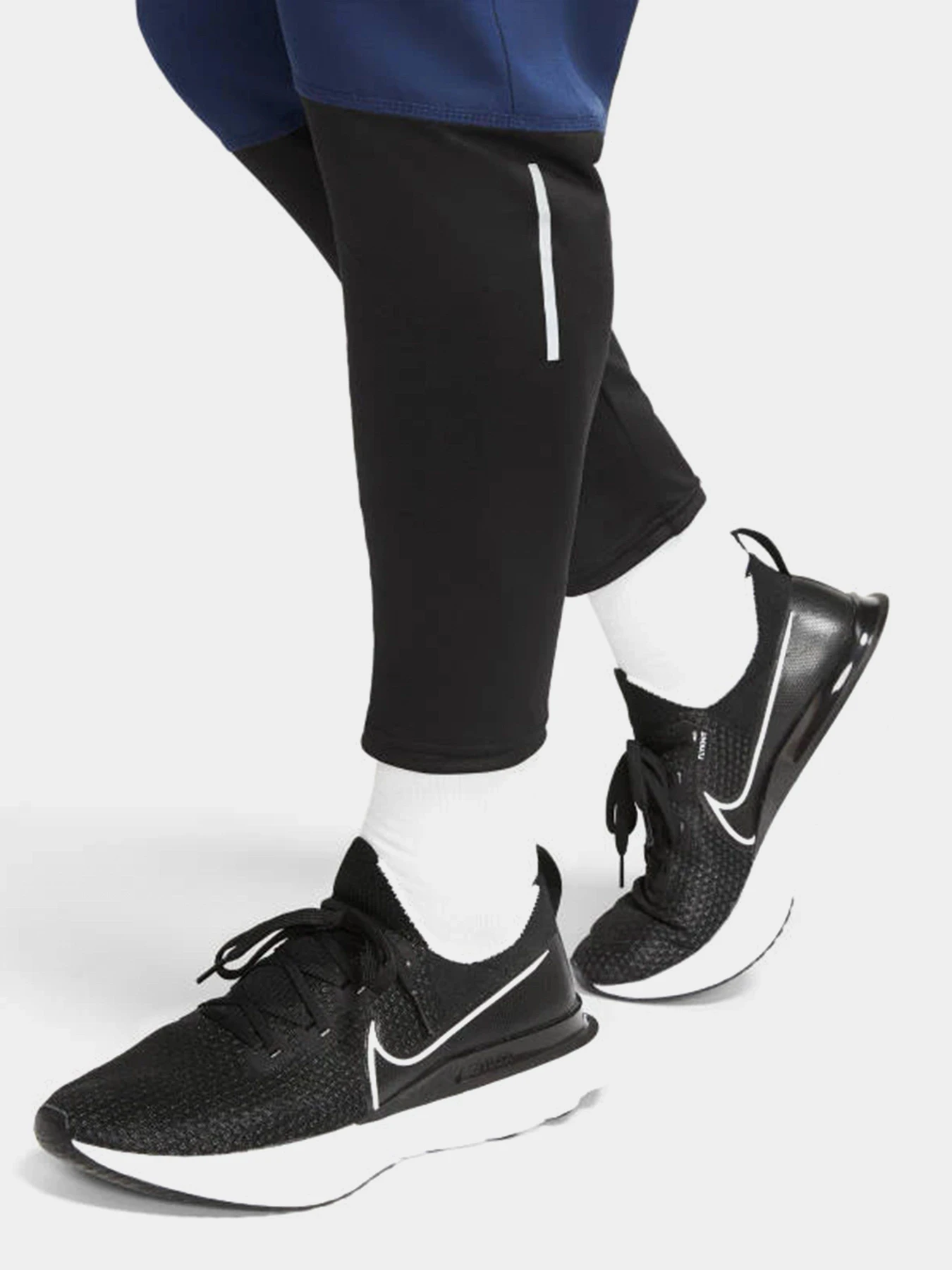 Брюки NIKE Essential Run Division running pants модель DA0412-410 Фото