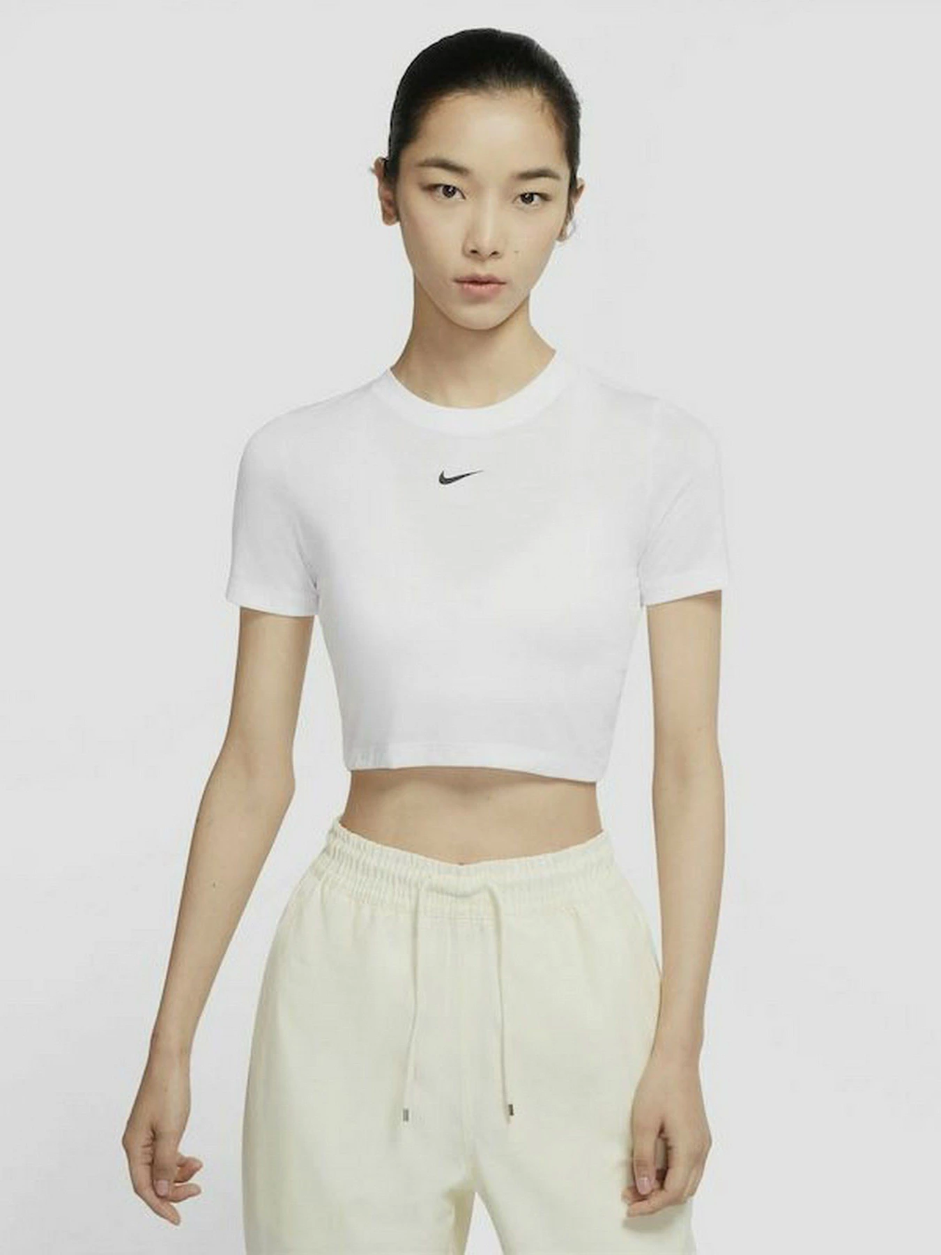 Футболки і поло NIKE Sportswear Essential модель DD1328-100 Футболки і поло NIKE Sportswear Essential модель DD1328-100 Фото