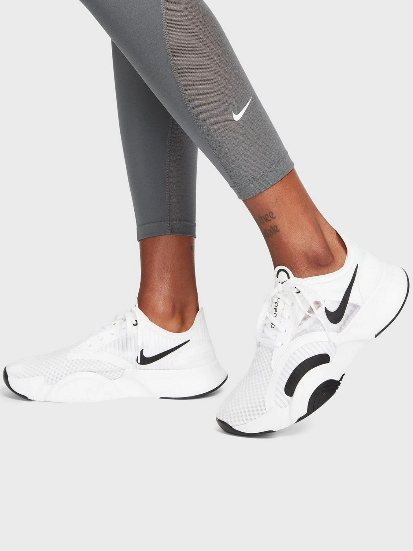 Брюки NIKE One Mid-Rise 7/8 модель DD0249-069 Брюки NIKE One Mid-Rise 7/8 модель DD0249-069 Фото