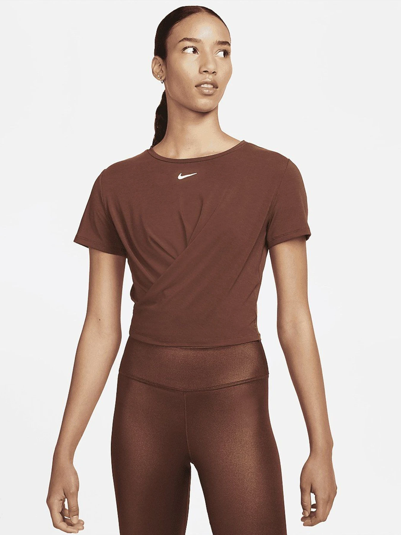 Футболки і поло NIKE W NK ONE LUXE DF SS TW TP модель DD4921-273 Футболки і поло NIKE W NK ONE LUXE DF SS TW TP модель DD4921-273 Фото