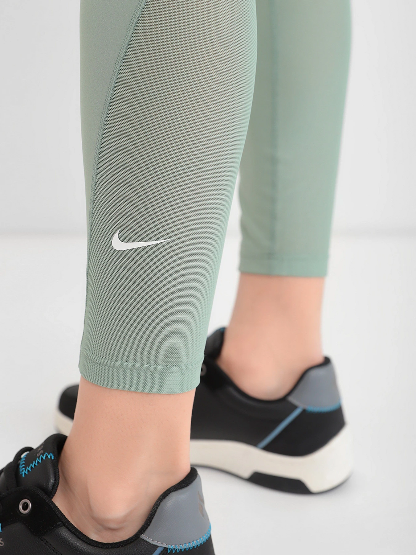 Штани NIKE One Mid-Rise 7/8 модель DD0249-357 Штани NIKE One Mid-Rise 7/8 модель DD0249-357 Фото