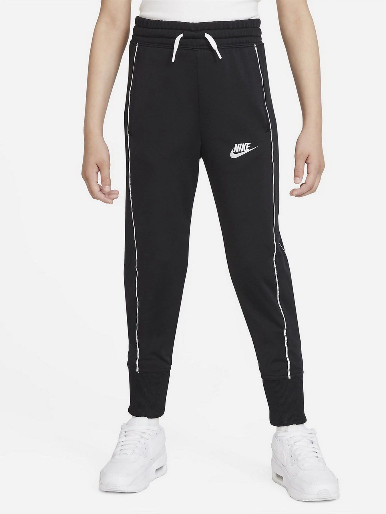 Костюмы NIKE G NSW TRK SUIT модель DD6302-010 Костюмы NIKE G NSW TRK SUIT модель DD6302-010 Фото