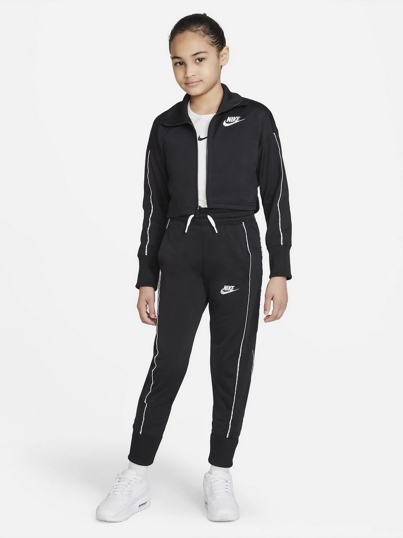 Костюмы NIKE G NSW TRK SUIT модель DD6302-010 Костюмы NIKE G NSW TRK SUIT модель DD6302-010 Фото