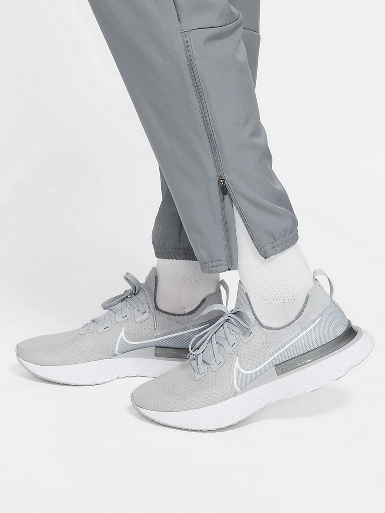 Брюки NIKE Dri-FIT Challenger Mens Woven Running Pants модель DD4894-084 Фото