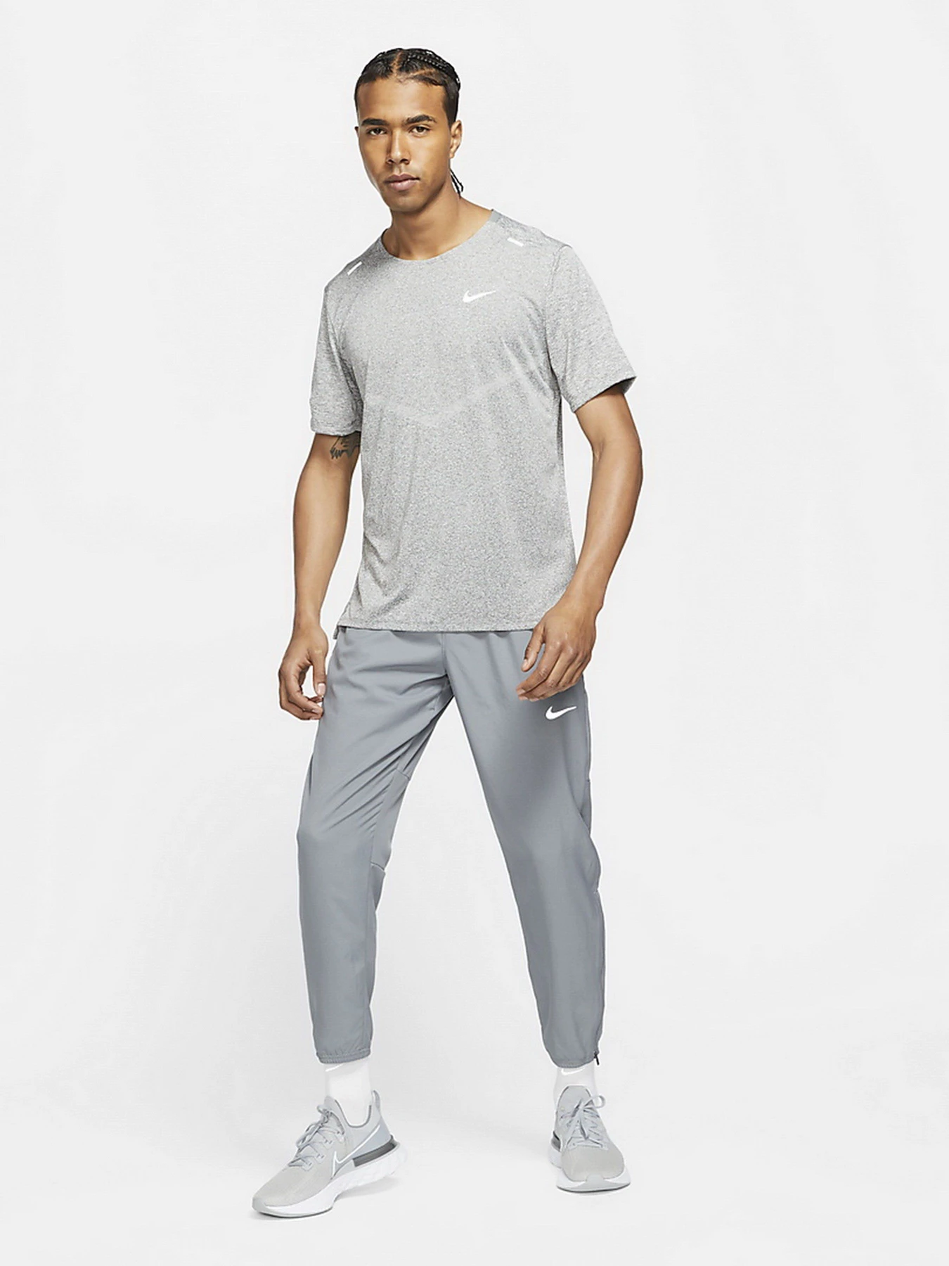Брюки NIKE Dri-FIT Challenger Mens Woven Running Pants модель DD4894-084 Фото