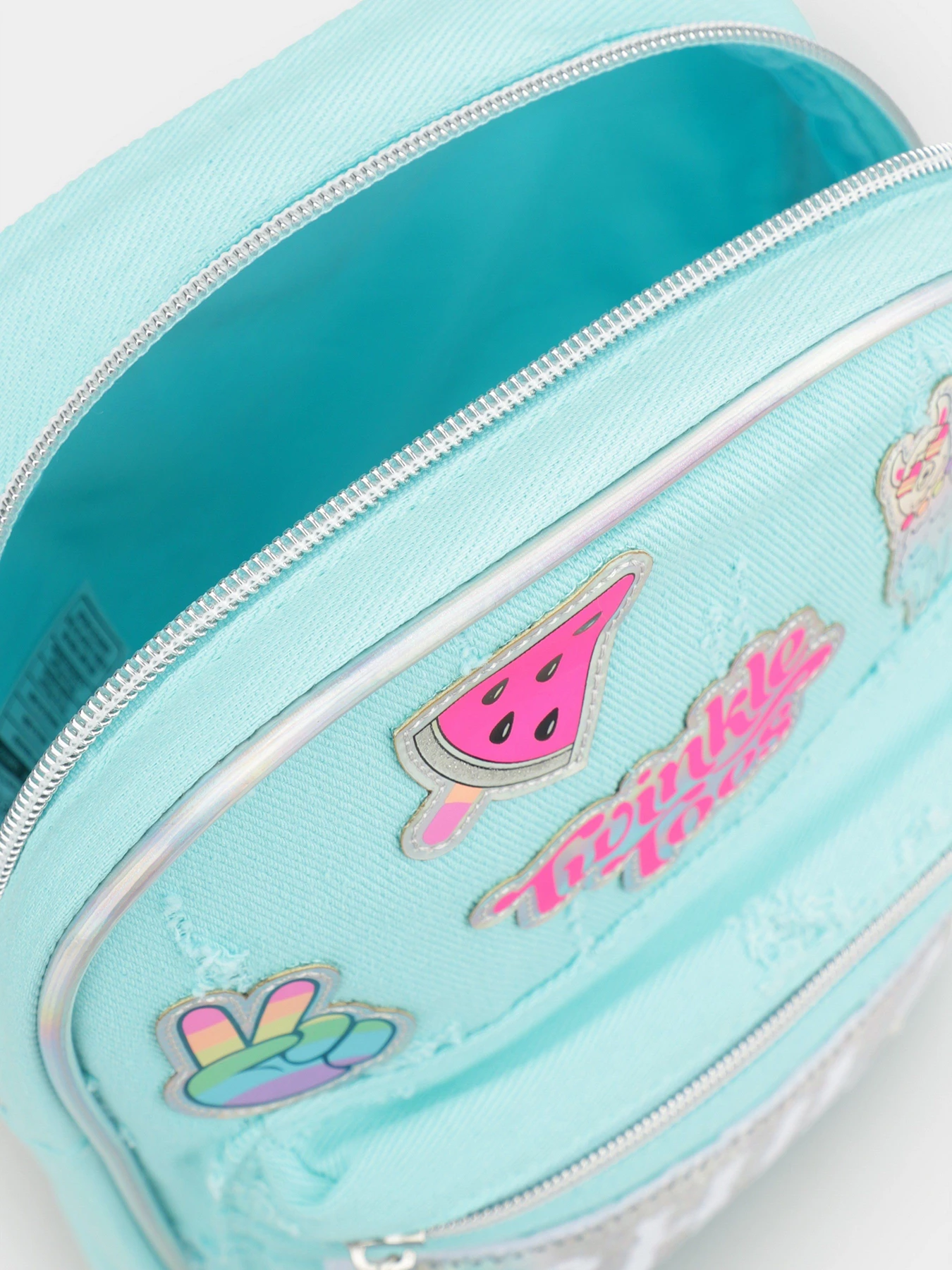Рюкзаки Skechers MINI REVERSE SEQUENCE TWINKLE TOES BACKPACK модель SKTT6883 AQUA Рюкзаки Skechers MINI REVERSE SEQUENCE TWINKLE TOES BACKPACK модель SKTT6883 AQUA Фото