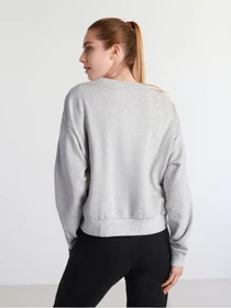 Свитры и кардиганы PUMA REBEL CREW NECK модель 58575004 Фото