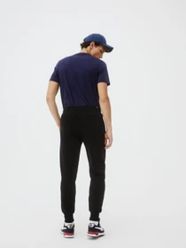 Штани PUMA ESS Logo Pants FL cl модель 58671401 Фото