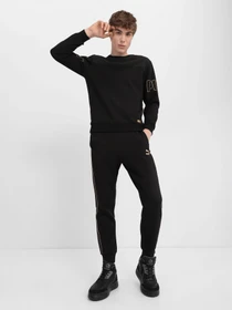Штани PUMA LUXE модель 53432501 Фото