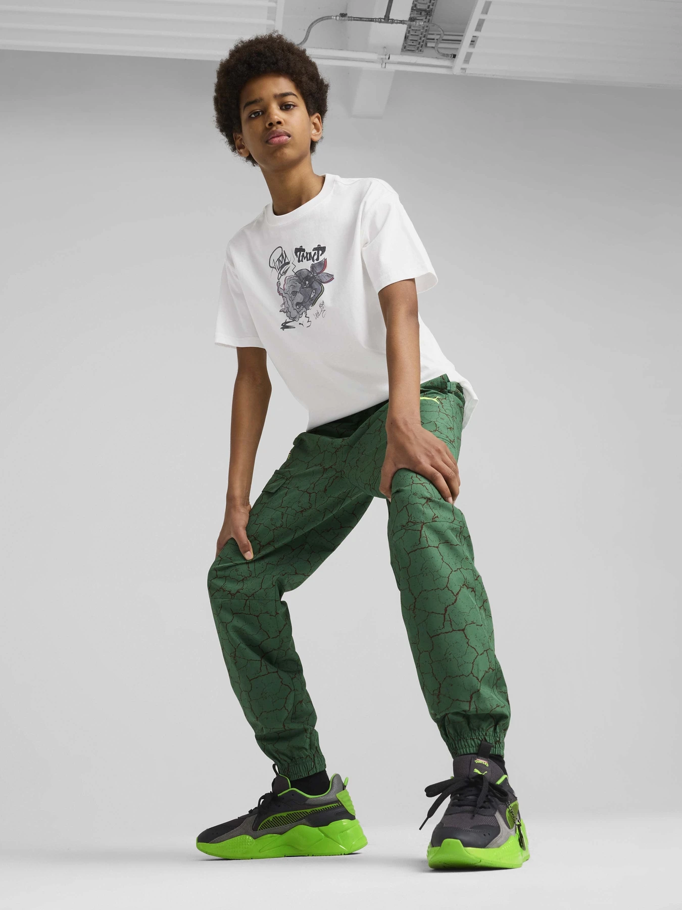 Футболки и поло PUMA HOOPS X TMNT модель 63008402 Футболки и поло PUMA HOOPS X TMNT модель 63008402 Фото
